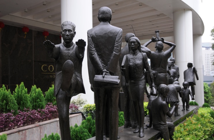 Hong Kong People statue in front of the Conrad Hotel 1